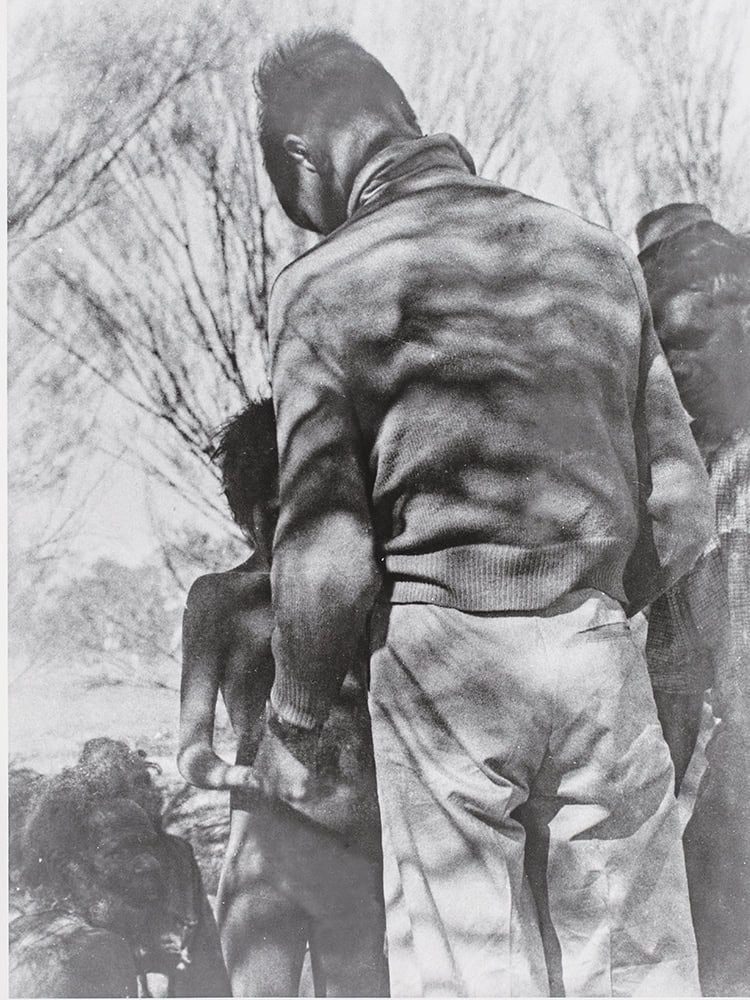 Dr John Hargrave examining Pintupi children Dr John Hargrave examining Pintupi children.